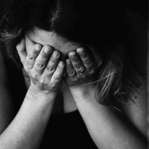 adult alone anxious black and white